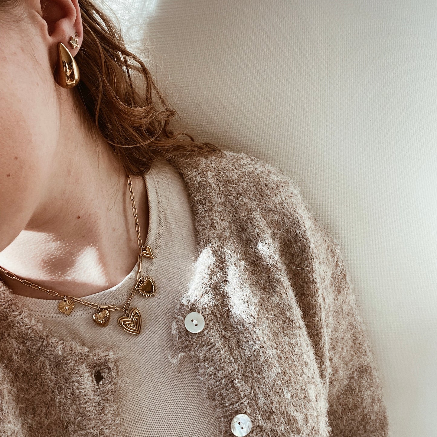 Multiple statement heart necklace