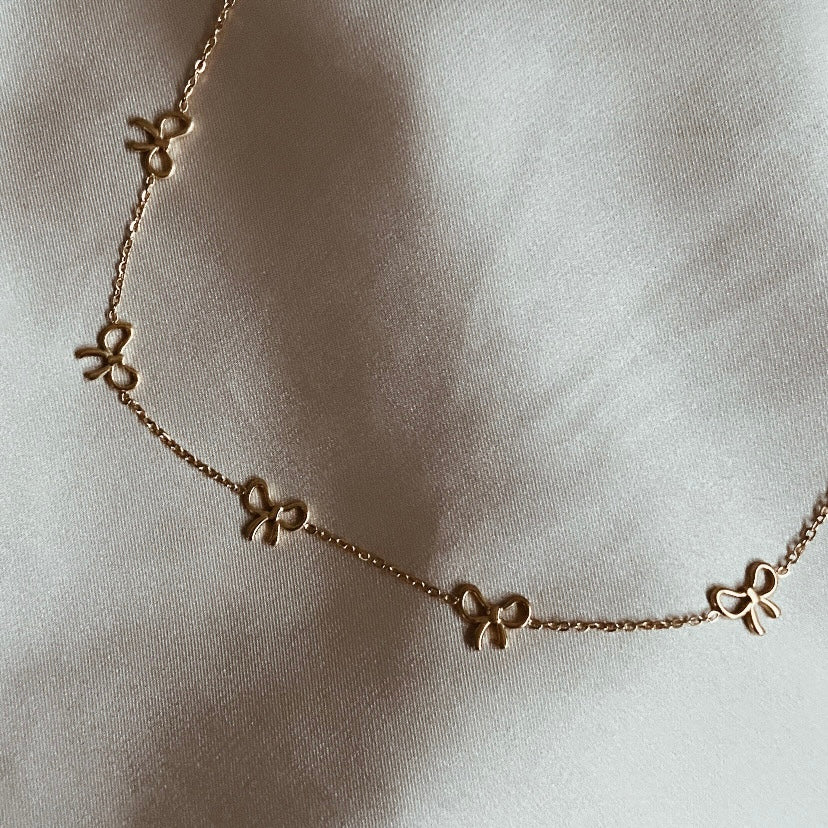 Multiple bow necklace