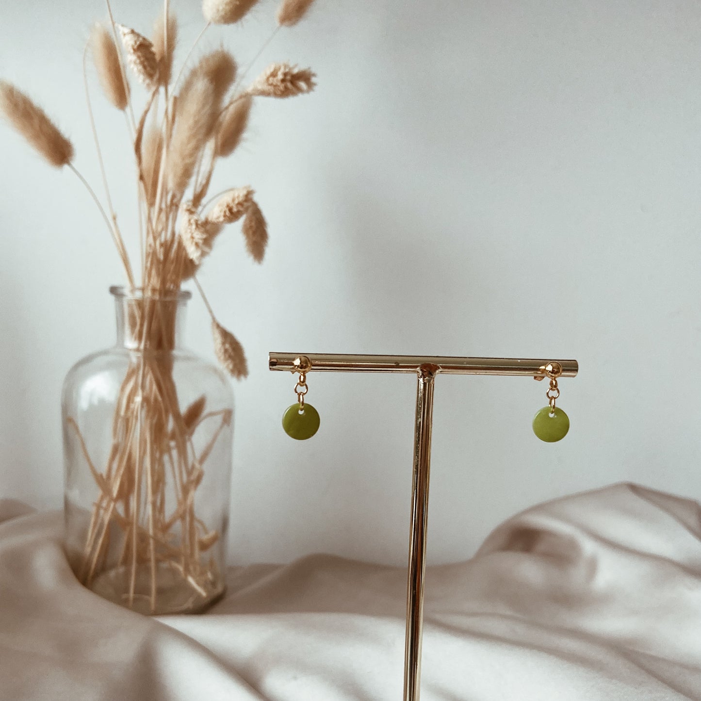 Green circle earrings