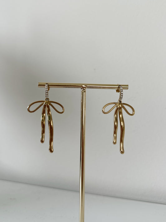Shiny bow earrings