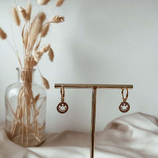 Pink smiley earrings